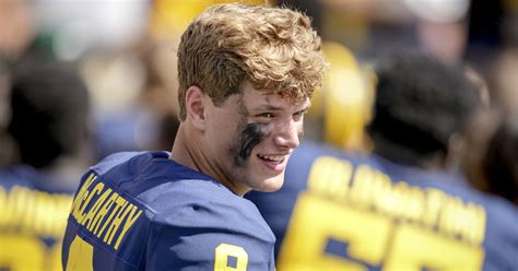 JJ McCarthy rocks 'Free Harbaugh' shirt to Michigan season opener