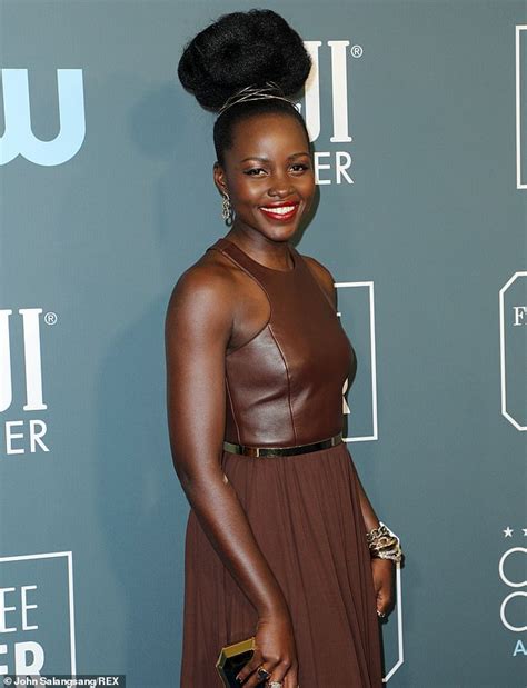 Lupita Nyongo Gives Goddess Vibes In Custom Brown Leather Gown And