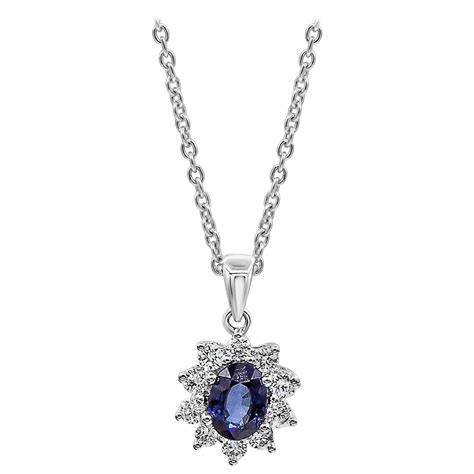 Roman Malakov Oval Cut Blue Sapphire And Diamond Halo Flower Pendant