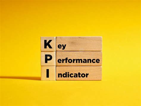 Wooden Cubes With The The Abbreviation Kpi Key Performance Indicator