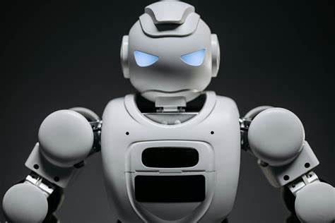 Close Up Shot Of White Robot Toy · Free Stock Photo