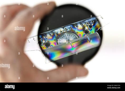 Transparent Plastic Protractor With Ruler Photographed Through A