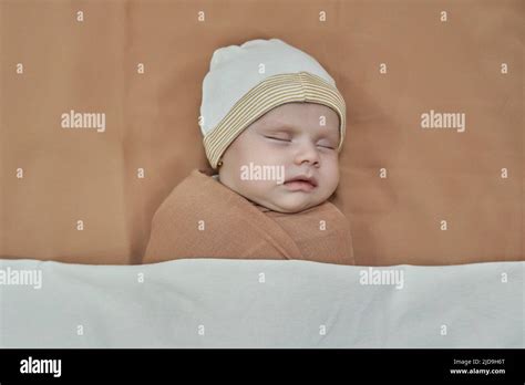 Newborn Baby Girl Sleeping On A Blanket Stock Photo Alamy