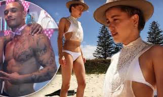 Amber Heard Shows Off Her Slender Figure In A White Bikini Daily Mail Online