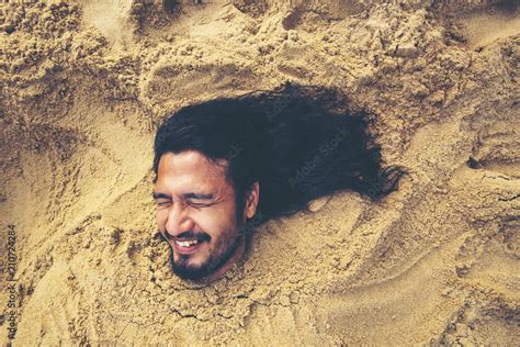 Man Buried In The Sand At The Beach Concept Happiness Vacation No