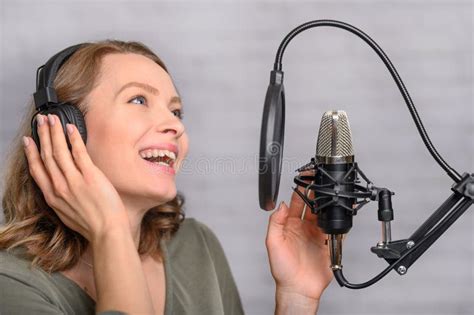 Radio Host On The Radio Working In The Studio Reading News Stock