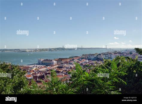 Panoramic View On 25th April Bridge Tagus River And Cristo Rei