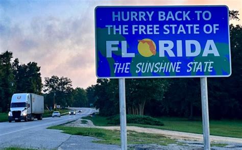 ‘hurry Back To The Free State Of Florida Signs Installed At State