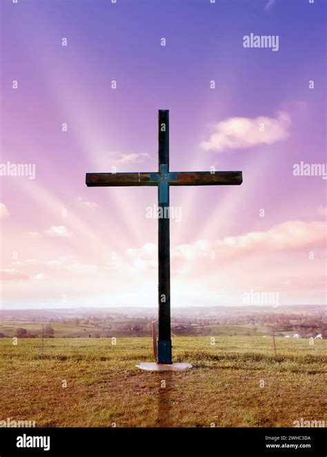 Christian Cross At Sunset Or Sunrise Stock Photo Alamy