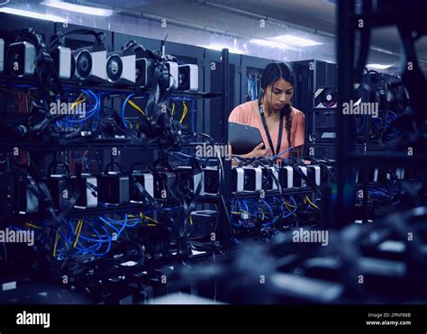 Female Technician Working In Server Room Stock Photo Alamy