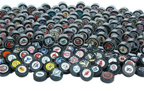 Huge Collection of Single Signed NHL Player Pucks (1,570)