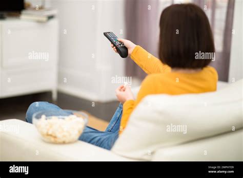 Unrecognizable Brunette Woman Switching Channels On TV Stock Photo Alamy