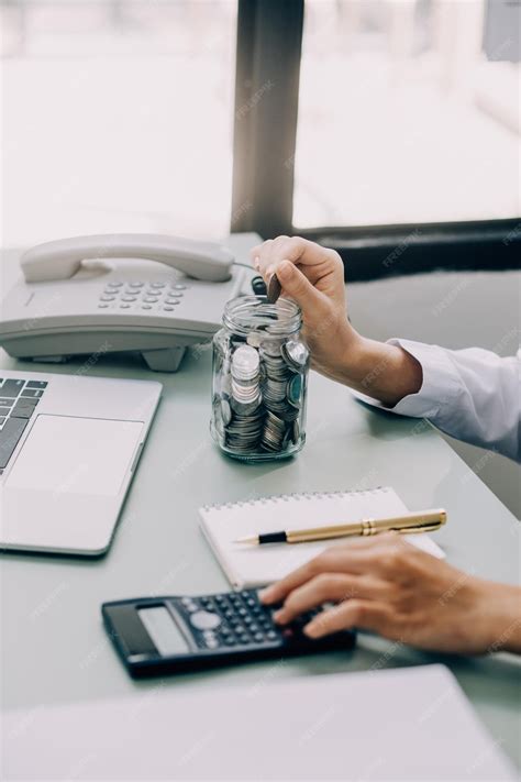 Premium Photo | Business women put coin stack money and many bank note