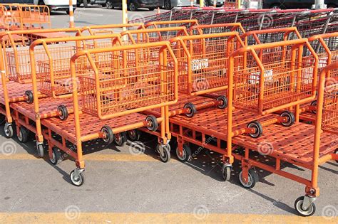 Orange Flatbed Shopping Carts Buggies Dollies Trollies Inside Each