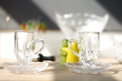 Small Tea Cups and Saucers from a Glass Teaset Stock Photo - Image of ...