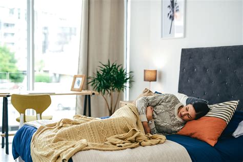 Wake Up Nauseous? Here's Why, According to Doctors
