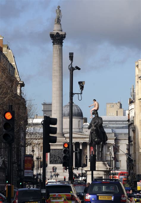 Naked Man Sits On Statue In Central London For Three Hours