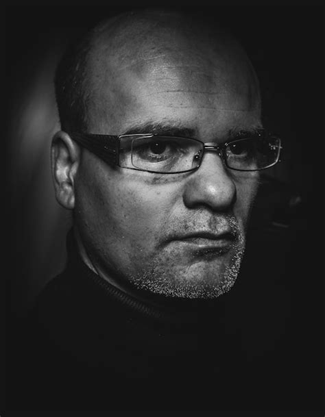 Premium Photo Close Up Portrait Of Man Wearing Eyeglasses Against