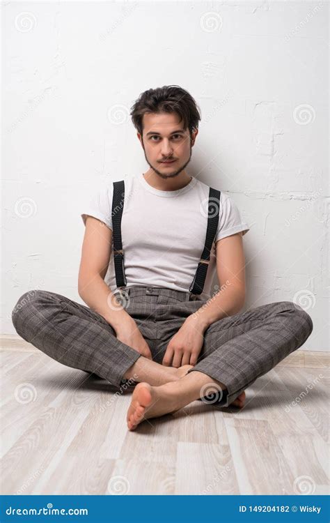 Handsome Brunette Against White Wall Shot Stock Photo Image Of Wall Slim