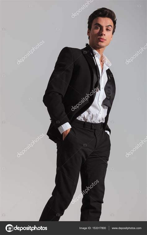 Side View Of An Elegant Man In Tuxedo Walking Stock Photo By Feedough