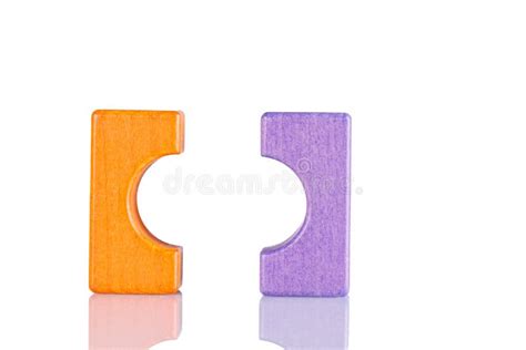 Wooden Figurine of Purple and Orange Color on a White Background Stock ...