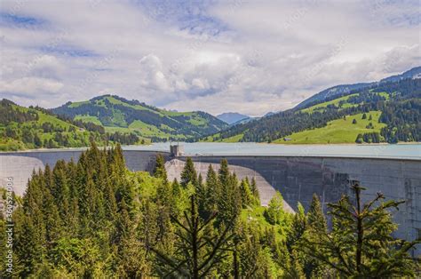 Beautiful Shot Of Lac De L Hongrin Dam With Mountains Under A Clear Sky