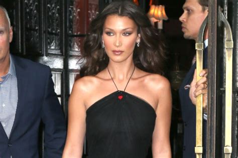 Bella Hadid Dons Sheer Dress with Red Power Pumps for Dior Bash in NYC – Footwear News