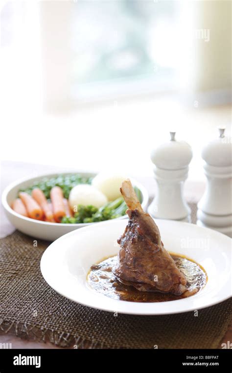 Leg of Lamb in Gravy Stock Photo - Alamy