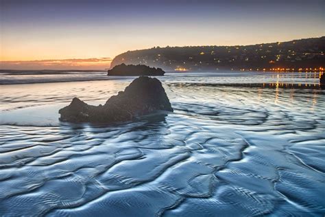 Rock Sunrise At Sumner Beach Christchurch New Zealand