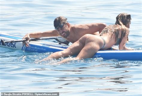 Gerard Piqu Showcases His Buff Body During Romantic Paddleboarding Session With Bikini