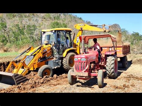 New Jcb Dx Fully Loading Soil Mud In Mahindra Di Tractor Trolley