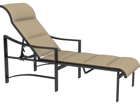 An Outdoor Chaise Lounge Chair With Beige Cushions And Black Frame Isolated Against A White