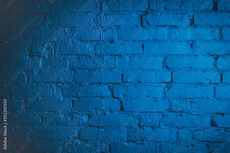 Blue brick wall. Background for an inscription. Stock Photo | Adobe Stock