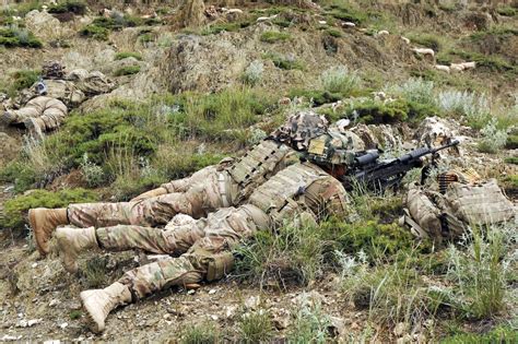 Us Soldiers Man An Over Watch Fighting Position During Their Mission