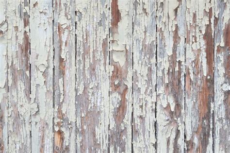 Vintage And Weathered Wooden Door Texture Background Stock Photo