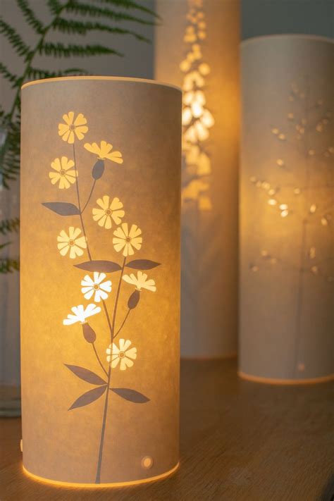 Glowing Handmade Parchment Paper Lamps With Cut Out Nature Designs By