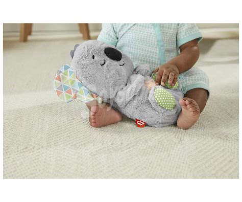 Fisher Price Peluche sensorial con respiración rítmica Koala acurruca y