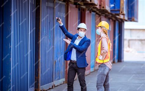 Premium Photo | Portrait team dock workers posing under working and ...