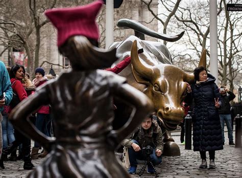 Photo Man Appears To Desecrate Fearless Girl Statue On Wall Street