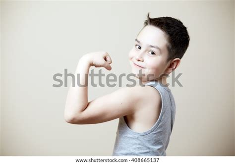 Cute Funny Kid Flexing Biceps Stock Photo (Edit Now) 408665137