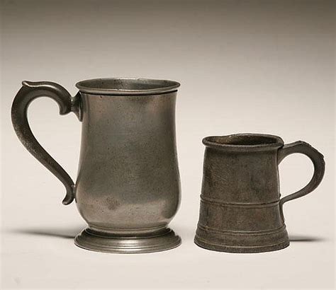 Lot - Two English pewter mugs;