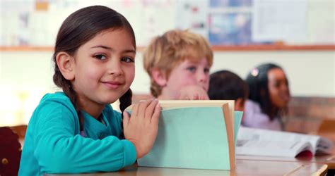 Blonde Pupil Smiling In The Classroom Stock Footage Video Shutterstock