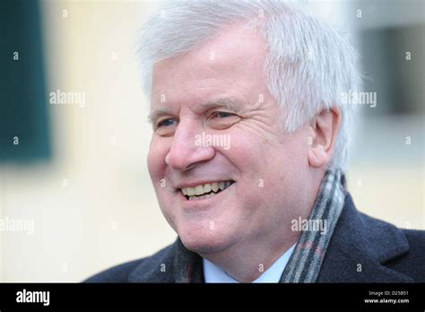 Premier of Bavaria Horst Seehofer (L) makes a press statement before ...