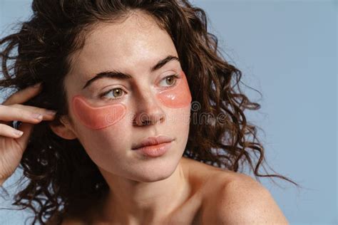 Beautiful Half Naked Nice Girl Posing With Eye Patches Stock Photo