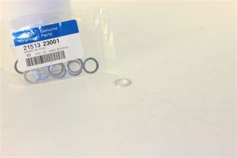 2151323001 HYUNDAI/KIA Прокладка пробки картера двигателя (половина ...
