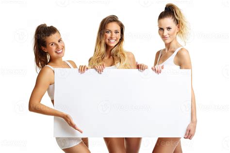 Group Of Happy Friends Posing In Underwear With Banner Stock