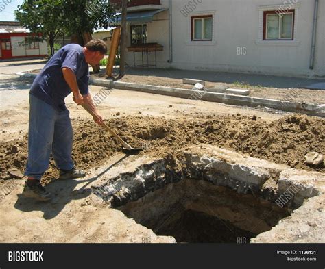 Man Digging Hole Image And Photo Free Trial Bigstock