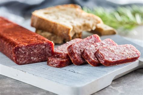 Smoked Sausage Sliced Salami On Cutting Board Stock Photo Image Of