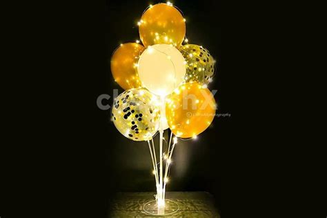 A Golden Sparkel Balloon Bouquet to enhance your birthday party ...