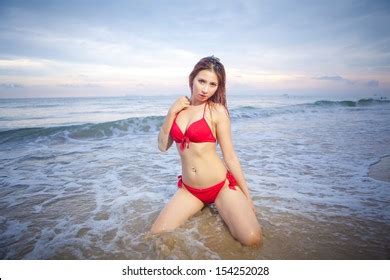 Beautiful Asian Woman Red Bikini Posing Stock Photo